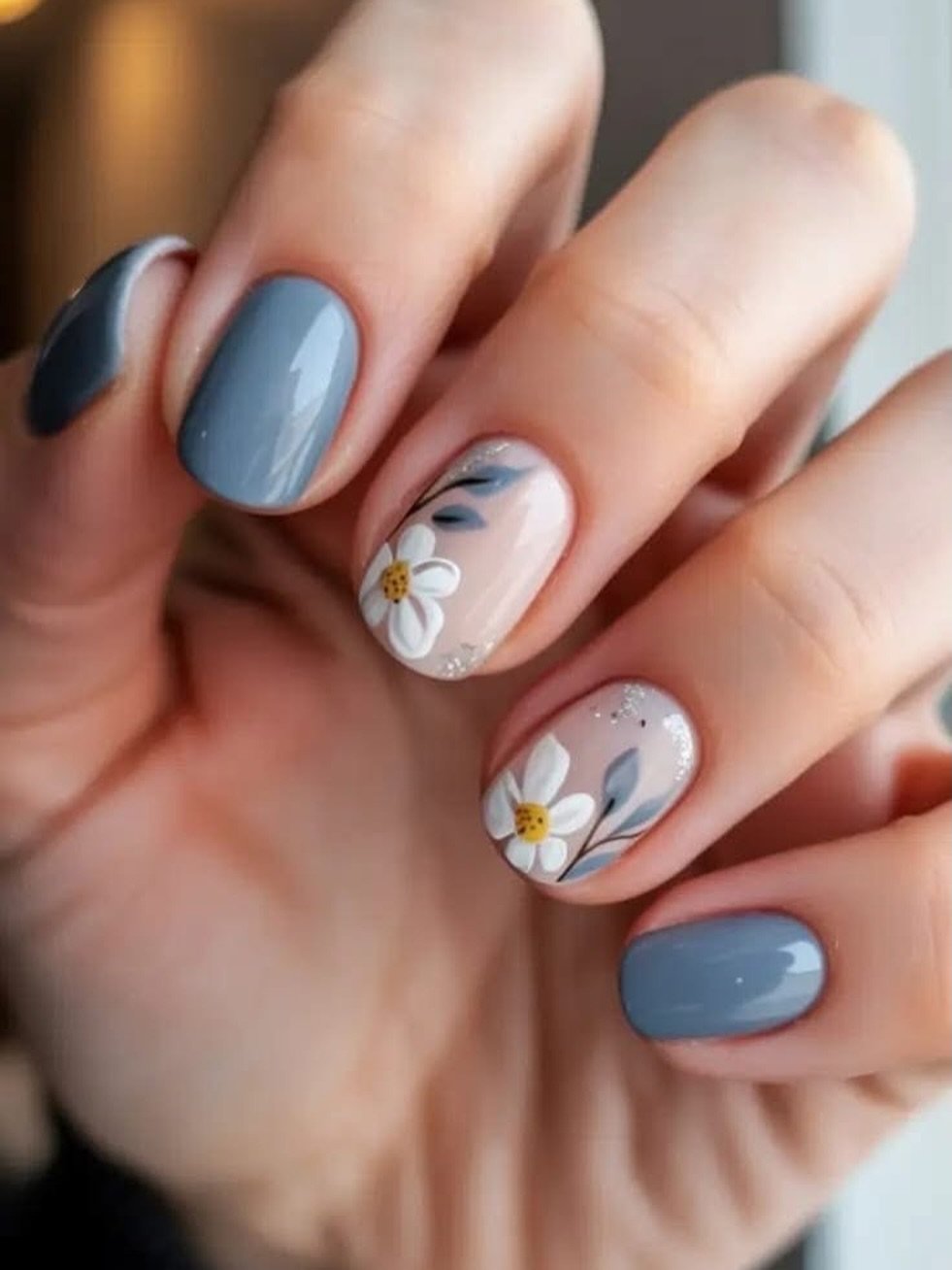 Short Blue Nails with White Floral Accent Nails
