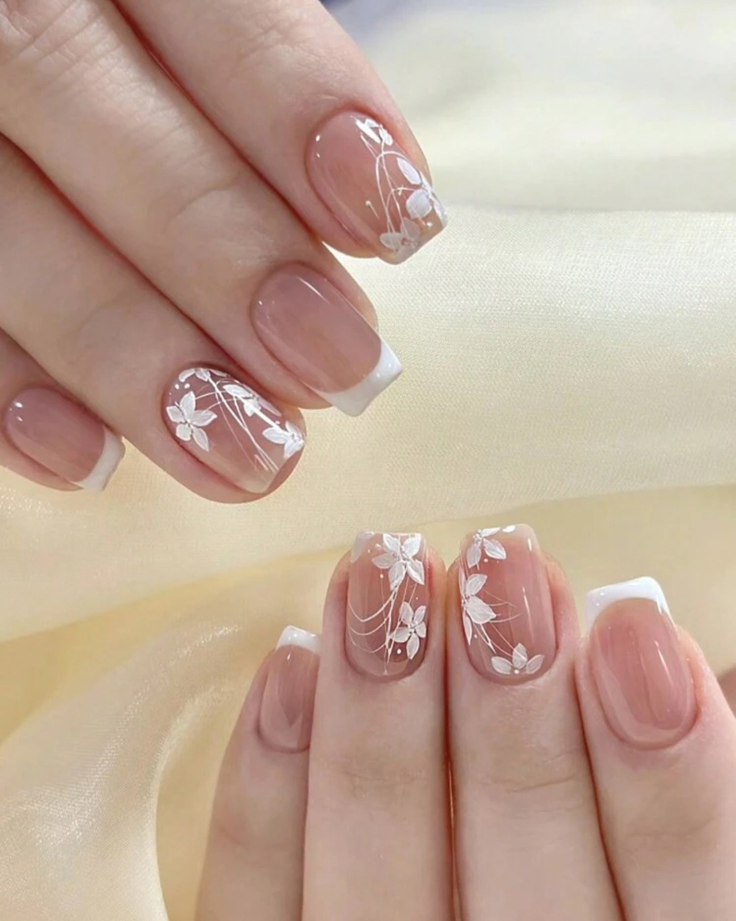 Short Sheer Pink Nails with White Floral Line Art