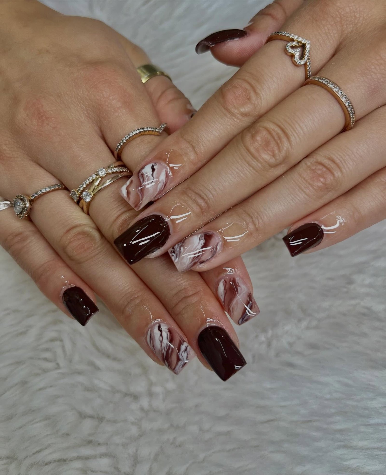 Short Nude Nails with Burgundy Tips and White Floral Accents