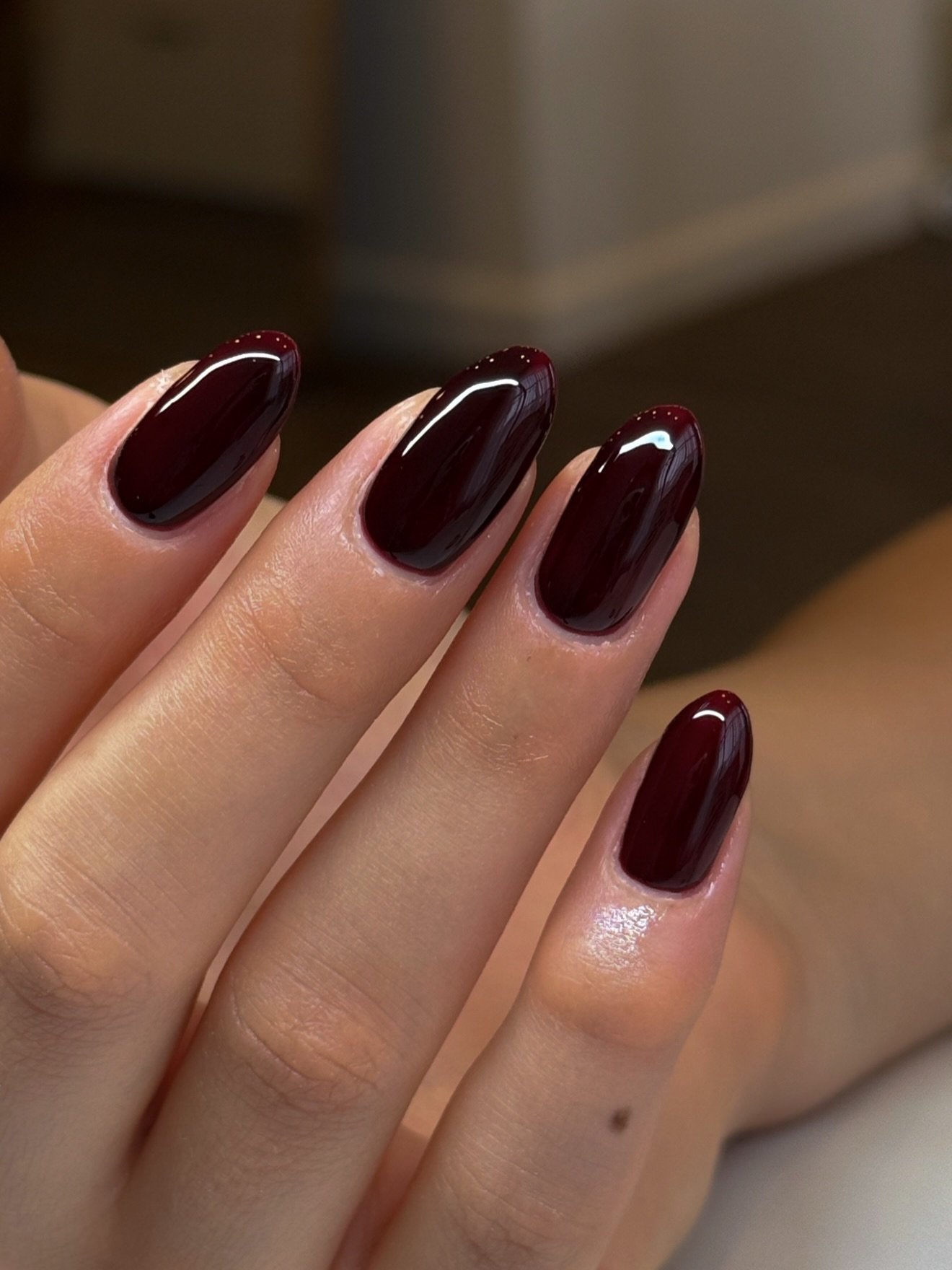 Glossy Dark Burgundy Almond Nails