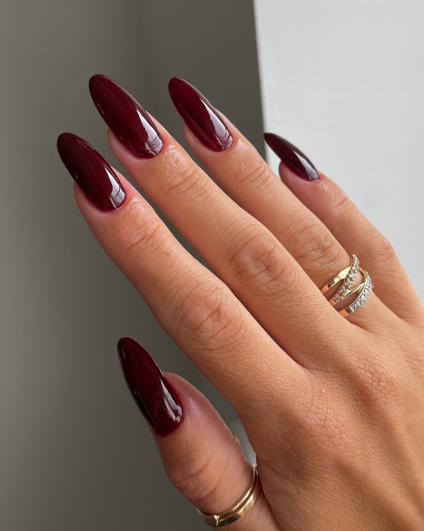 Deep Burgundy Almond Nails with Glossy Finish