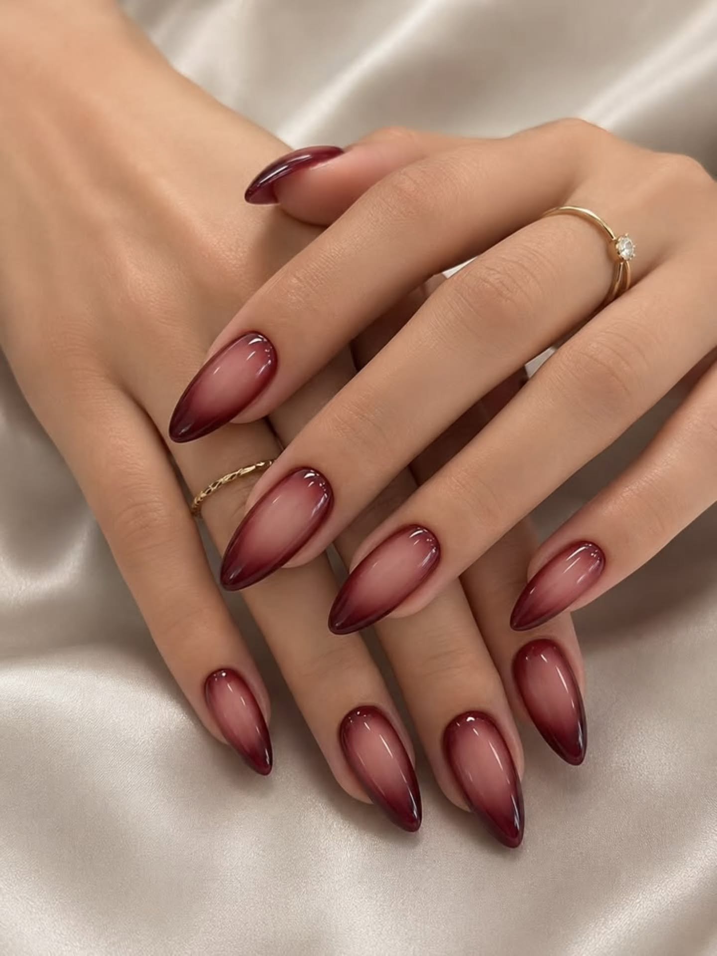 Sheer Nude and Burgundy Almond Nails