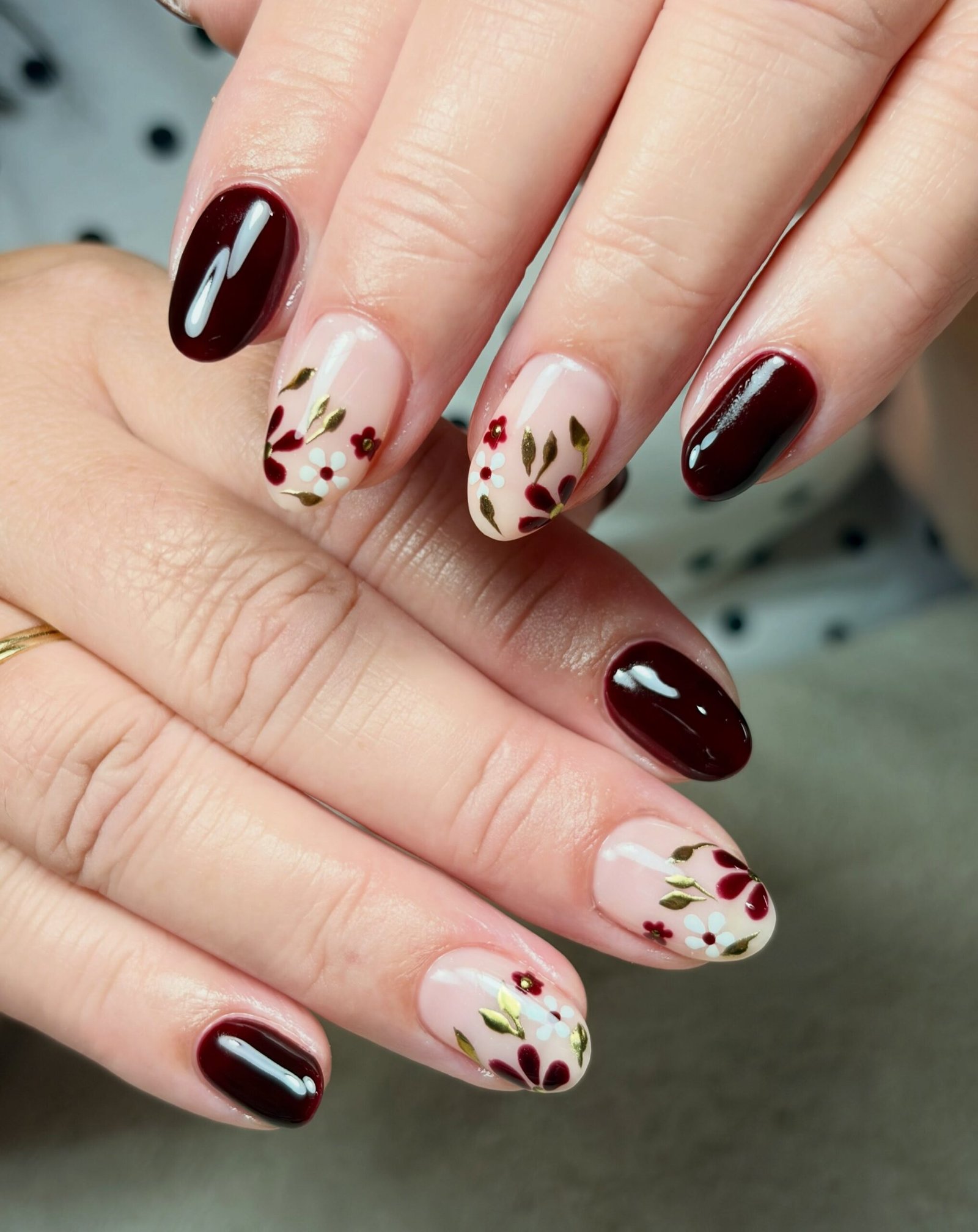 Burgundy Nails with Cream Floral Leaf Accents