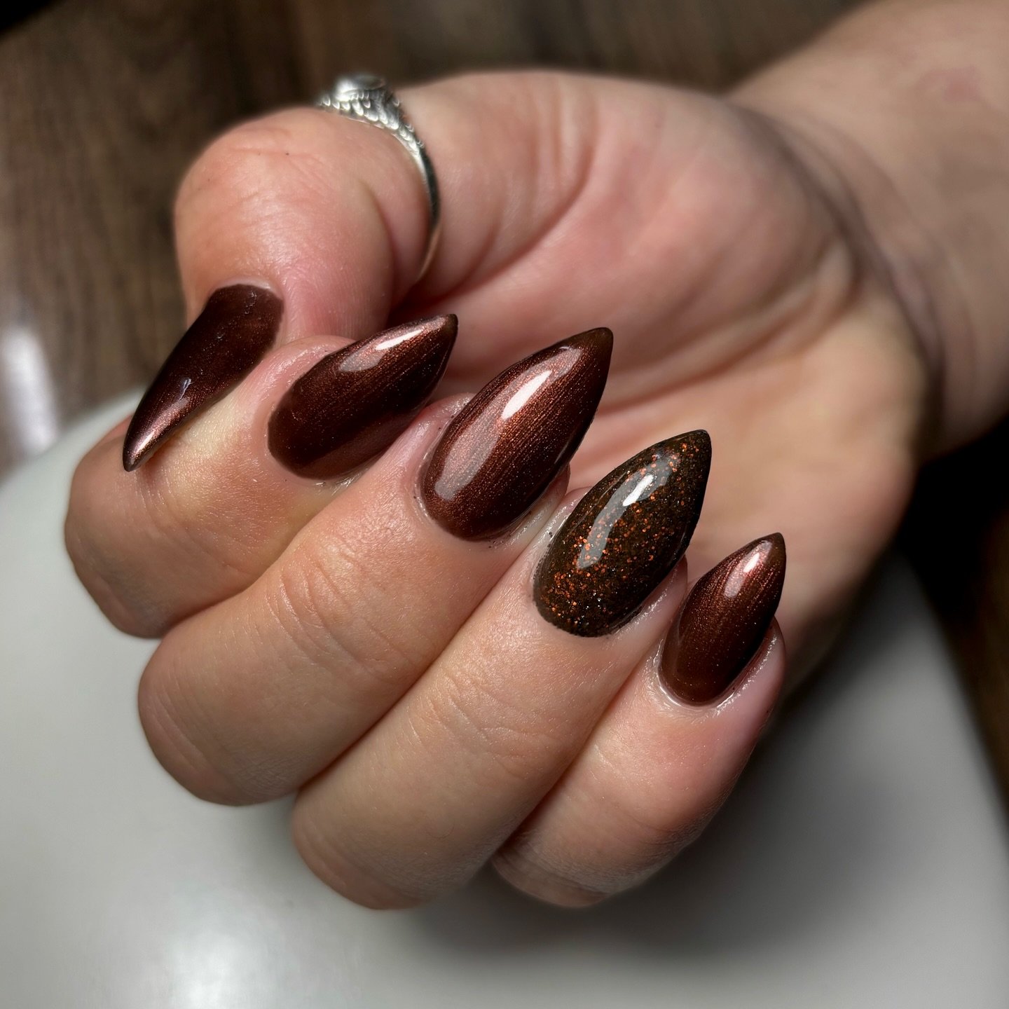Brown and Burgundy Almond Nails with Glitter