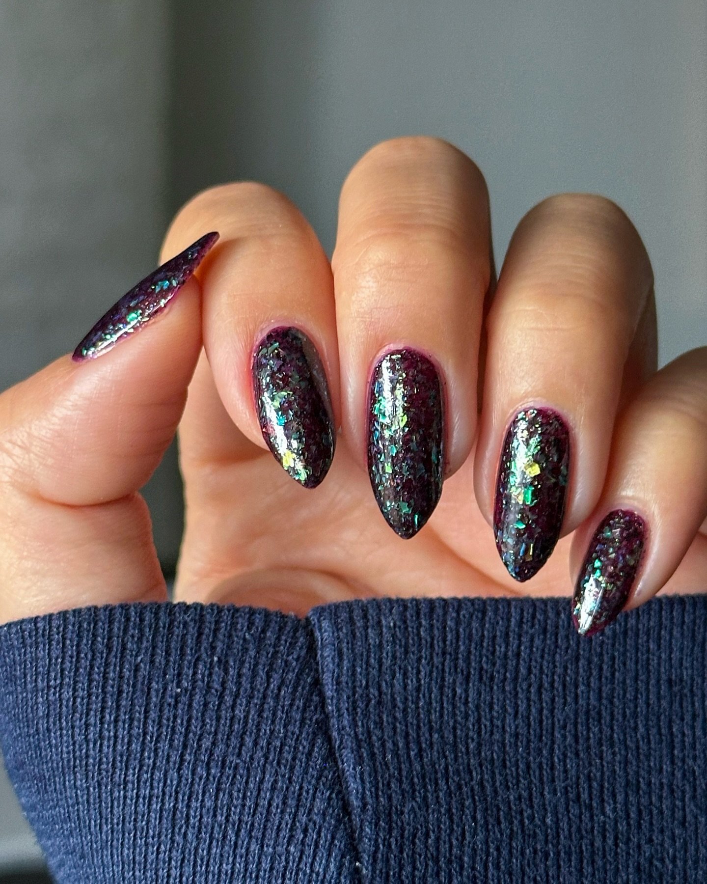 Black Almond Nails with Multicolor Glitter Sparkle