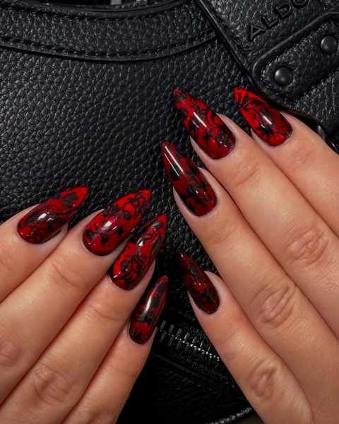 Long Red Nails with Black Floral and Leaf Details