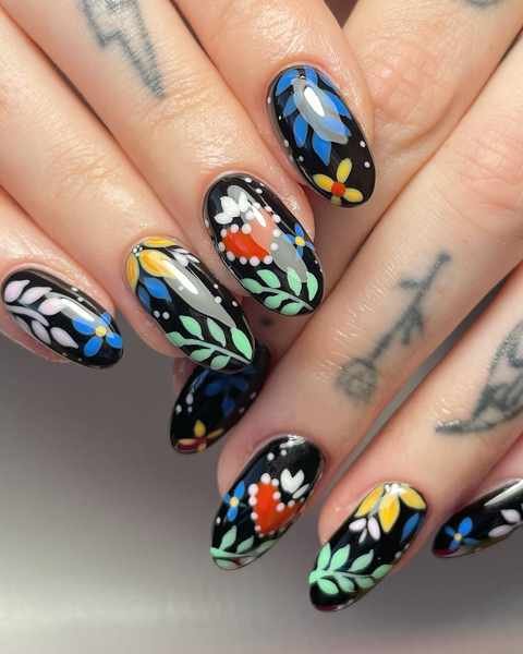 Black and Blue Nails with Bright Floral and Leaf Art