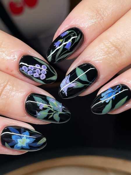 Black Nails with Colorful Botanical and Starburst Details