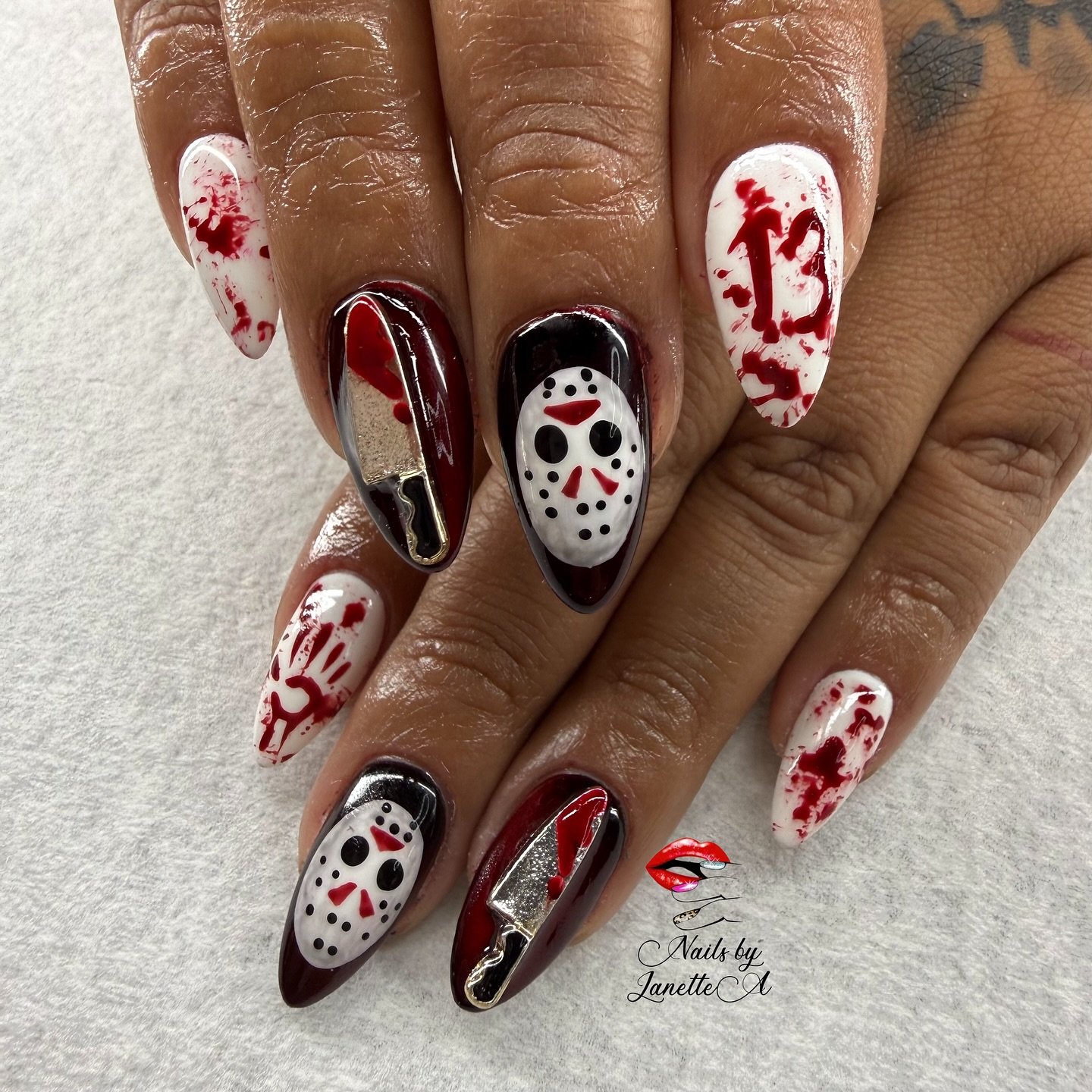 Blood-Splattered White and Deep Red Halloween Nails
