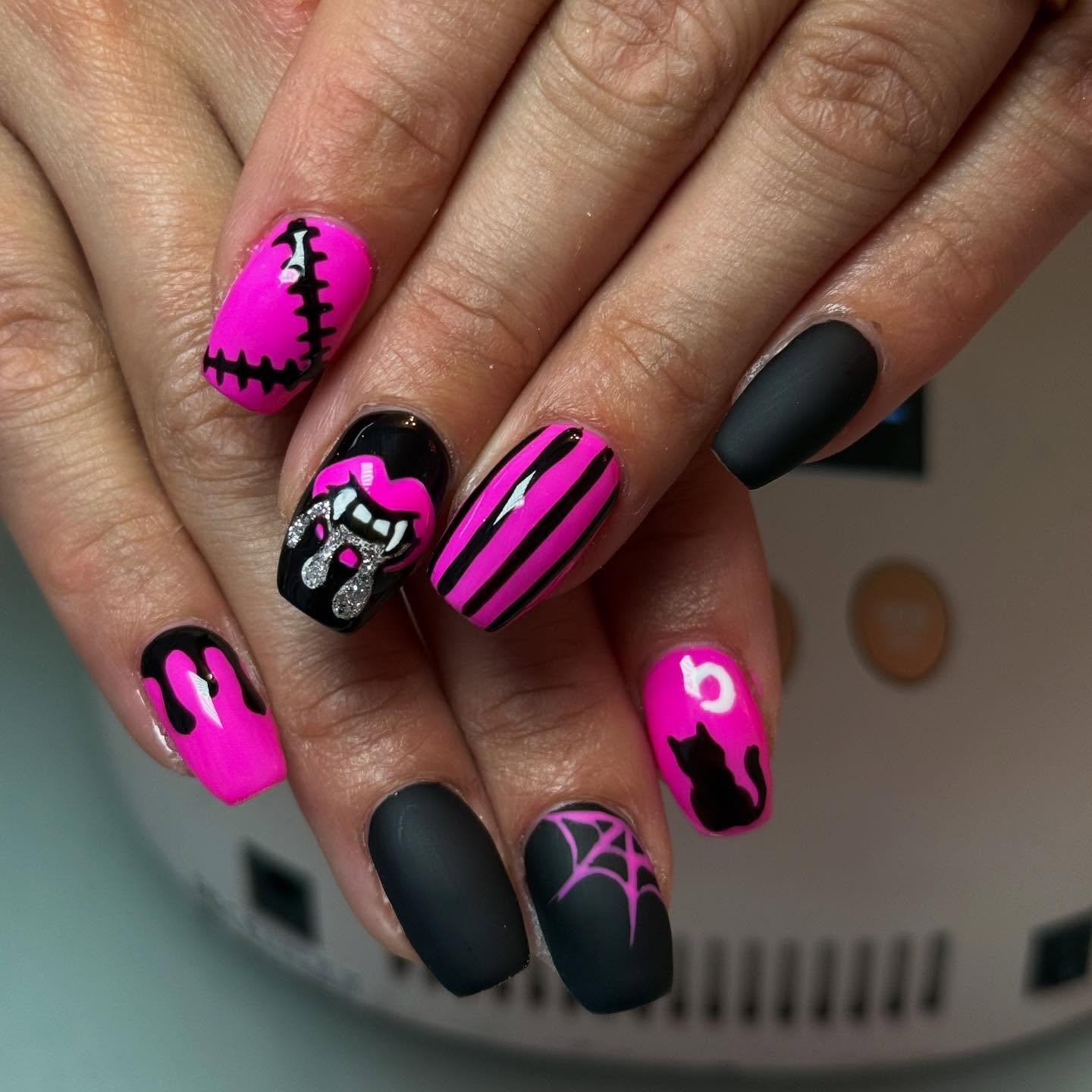 Neon Pink and Black Halloween Nails with Stitching and Bats
