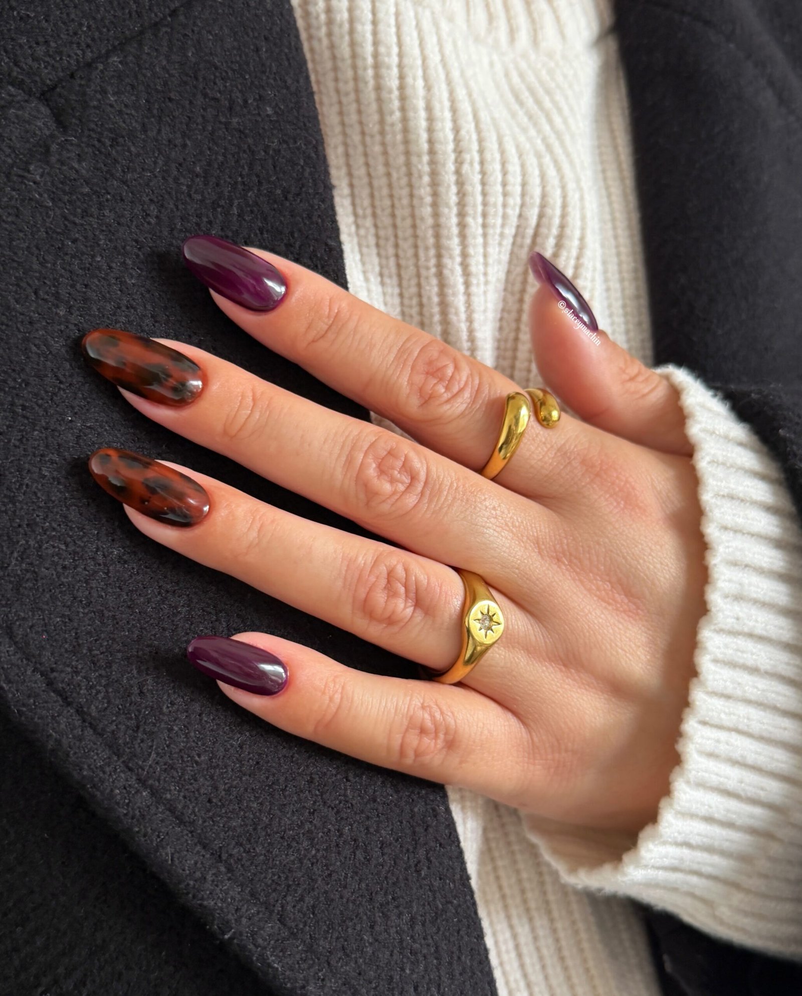 Plum Nails with Warm Brown Marble-Like Accents