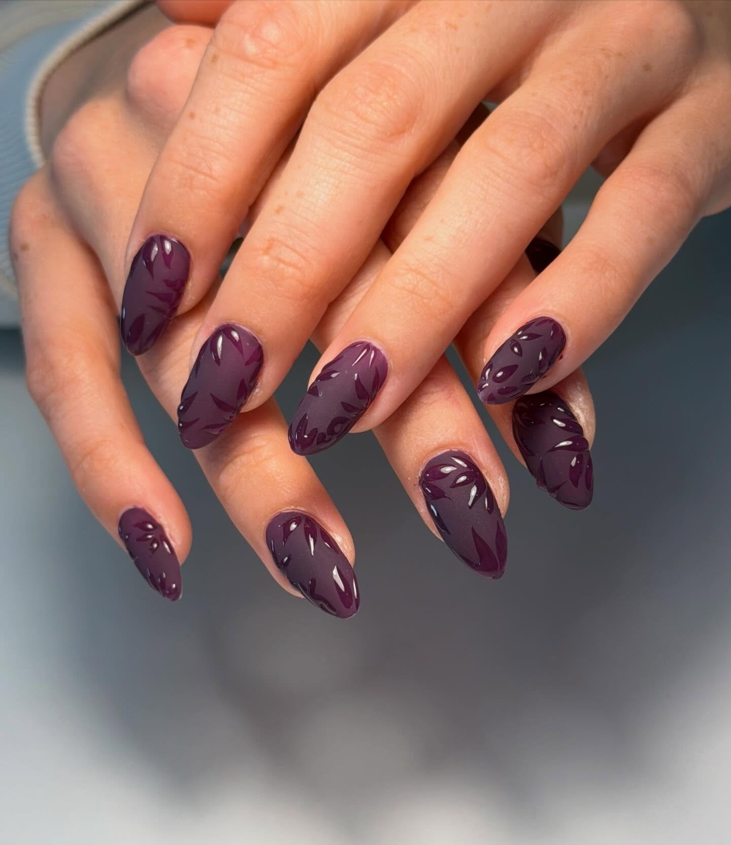 Purple Almond Nails with Dark Decorative Patterning