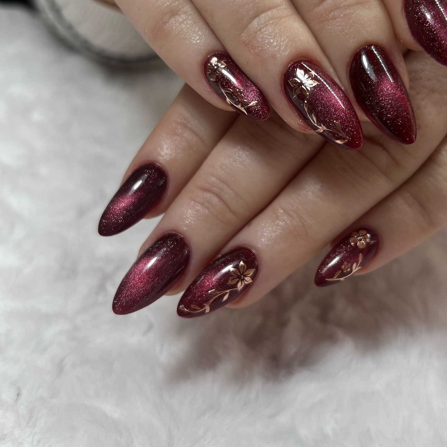 Wine Almond Nails with Gold Foil Accents