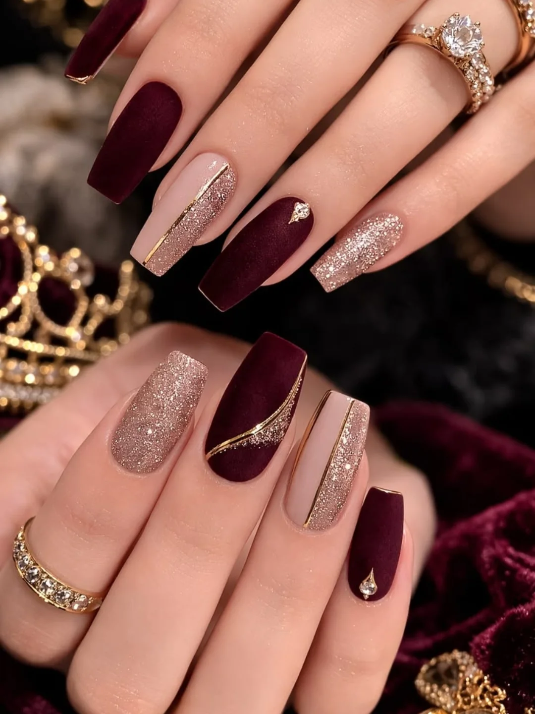 Burgundy and Nude Almond Nails with Gold Lines