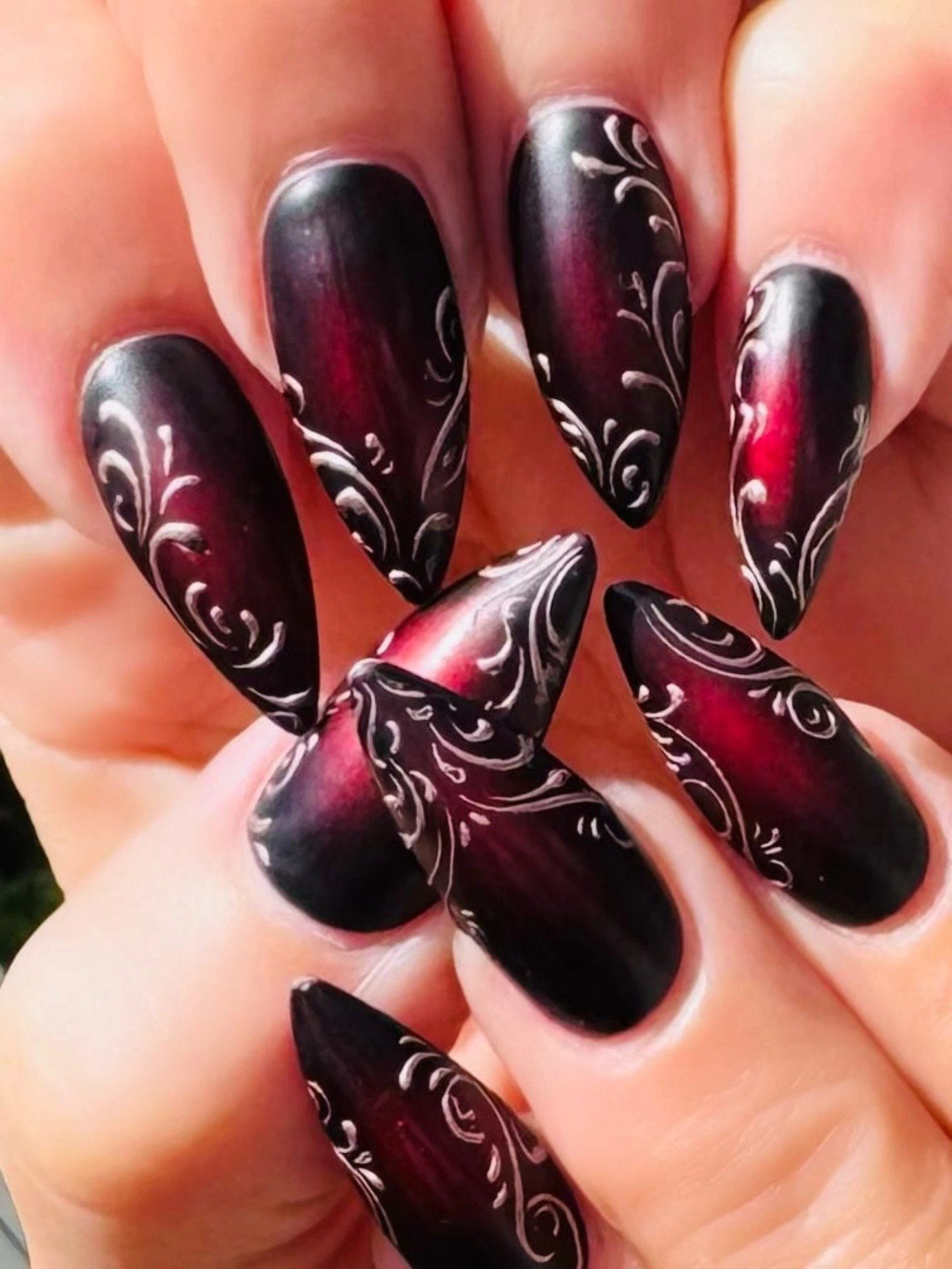 Black and Burgundy Nails with White Floral Details