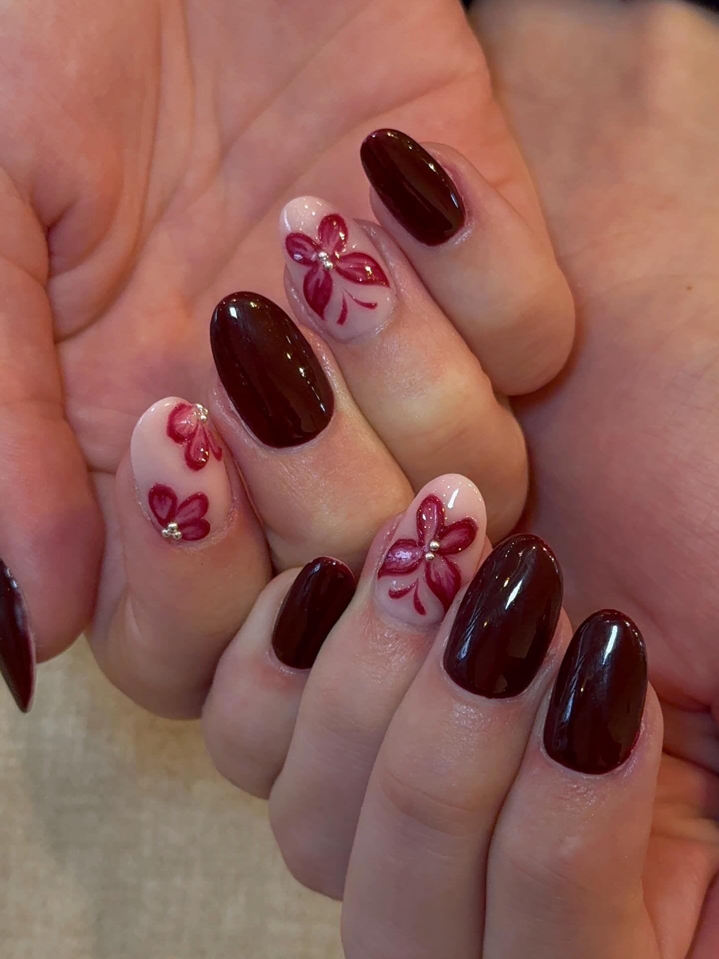 Wine Almond Nails with Floral Accent Details