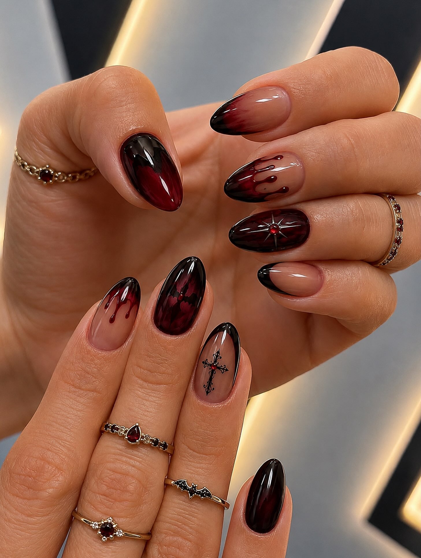 Mixed Burgundy Almond Nails with Dark Accents