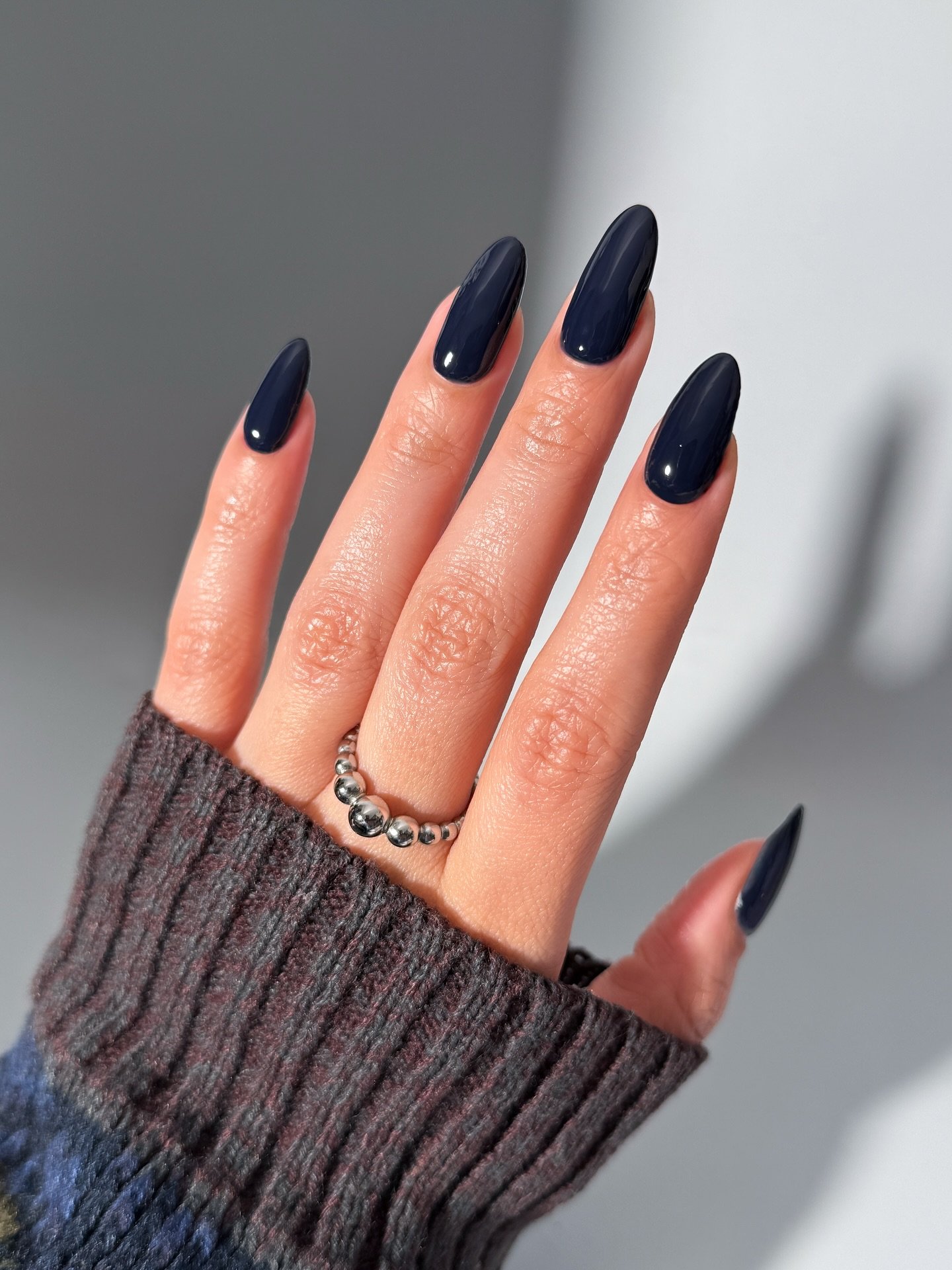 Navy Almond Nails with a Glossy Finish