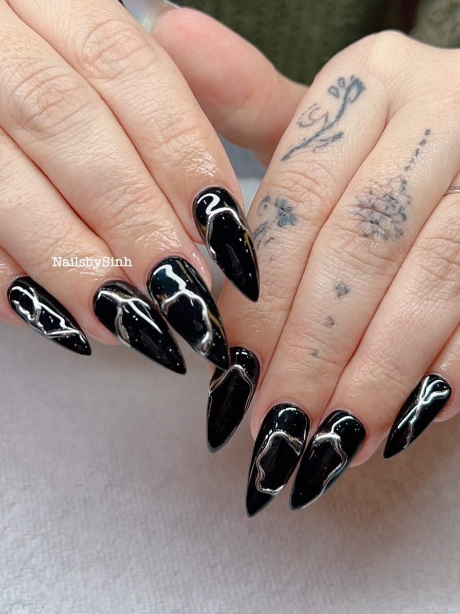 Black Stiletto Nails with White and Silver Line Details