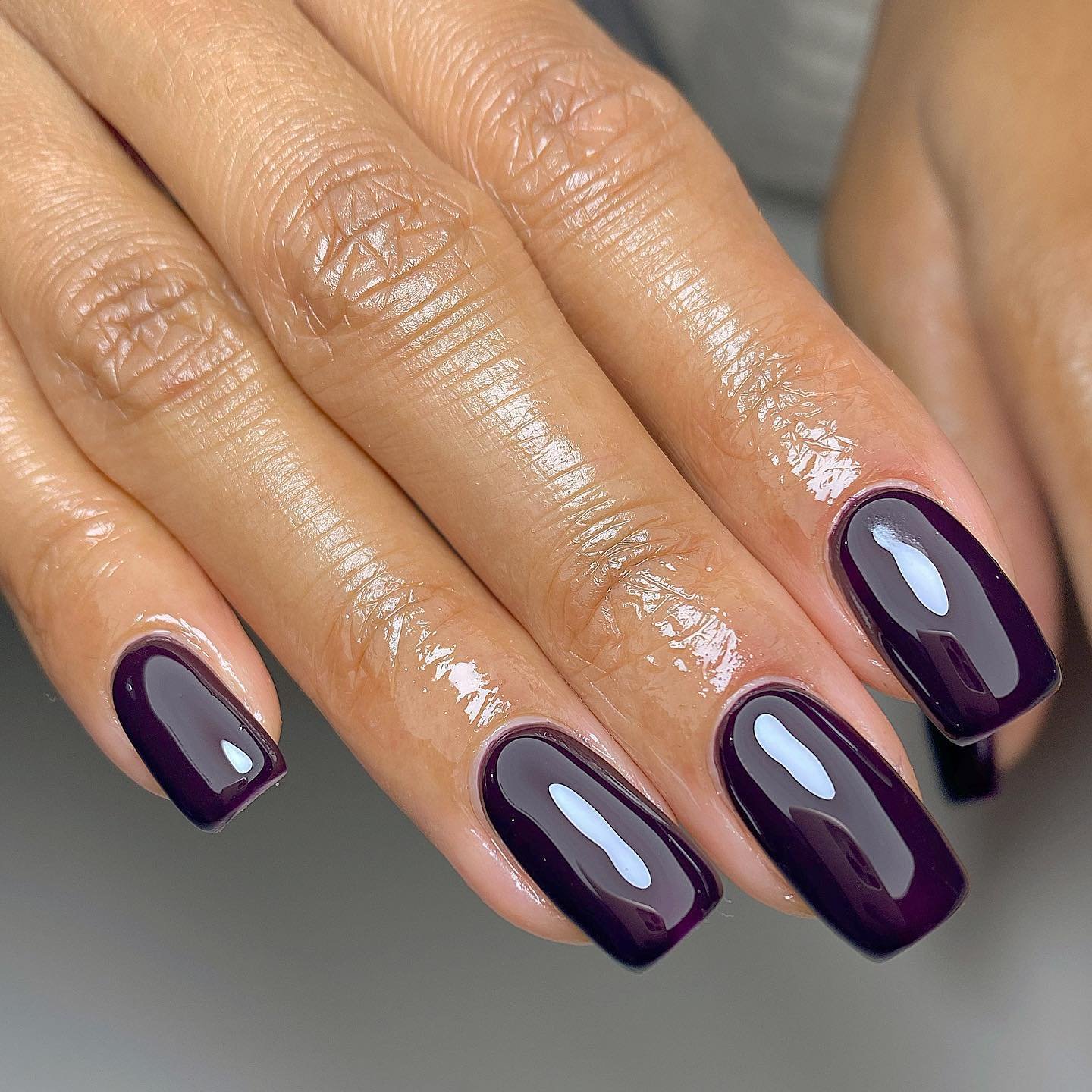 Short Purple Nails with Bright Glossy Highlights