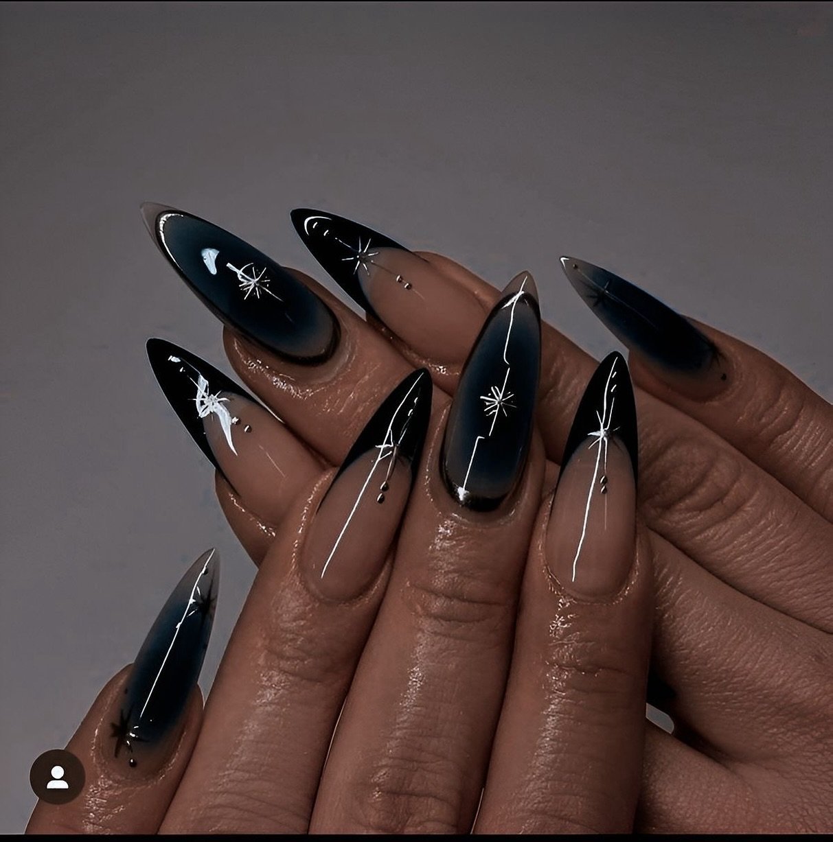 Black Stiletto Nails with Silver Graphic Details