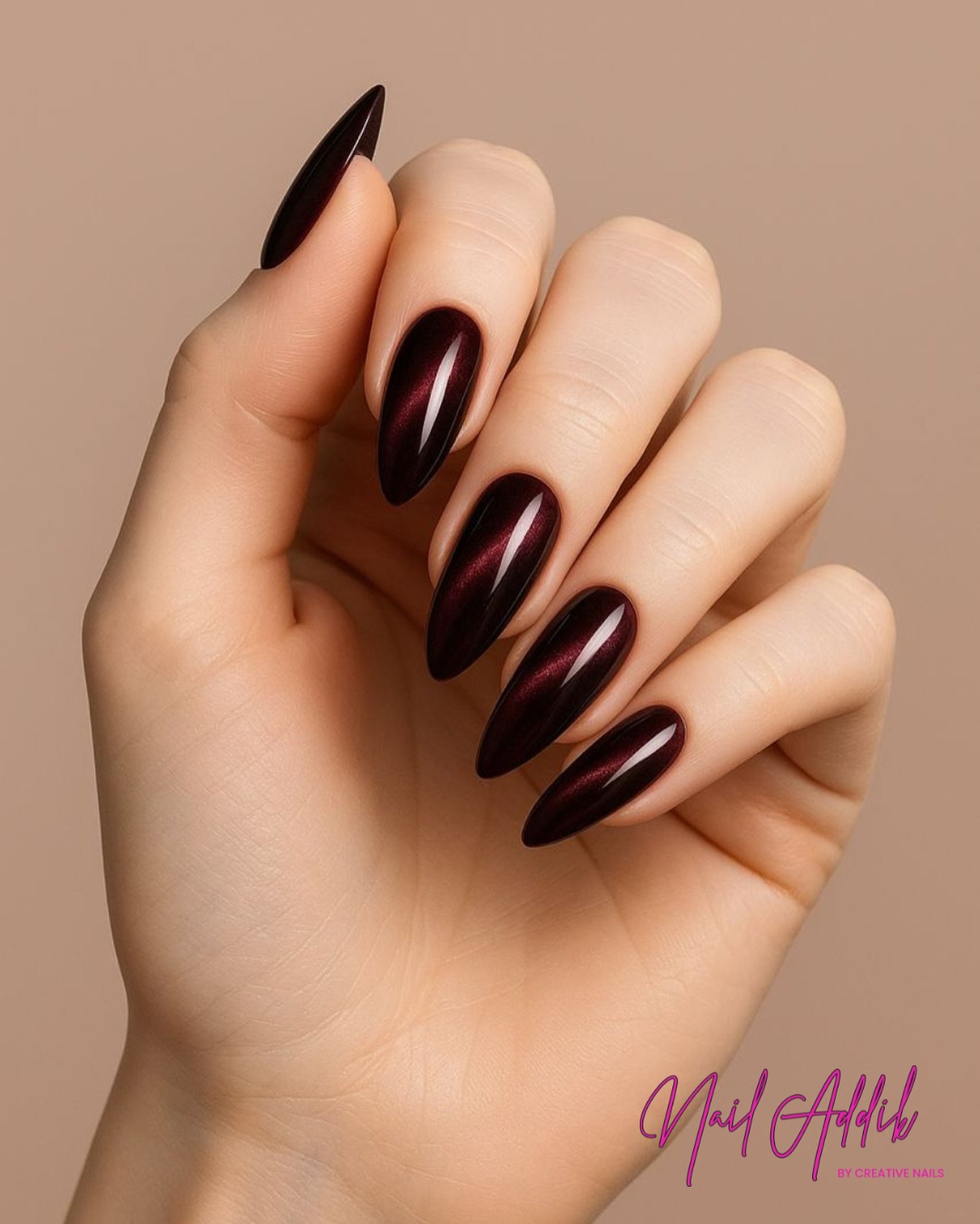 Burgundy Almond Nails with Fine Gold Details