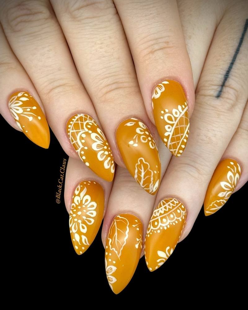 Yellow Almond Nails with White Floral Dot Details