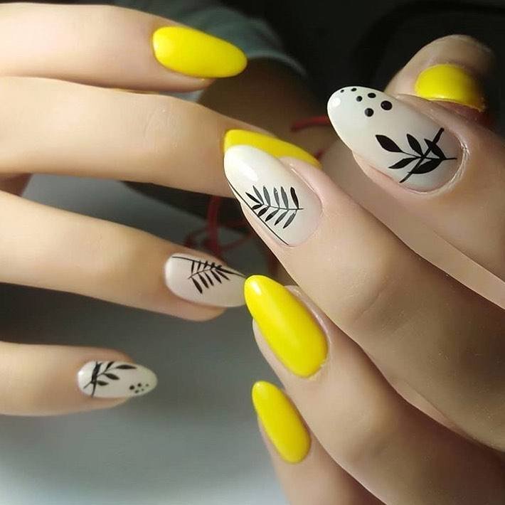 Yellow and White Nails with Simple Black Line Art