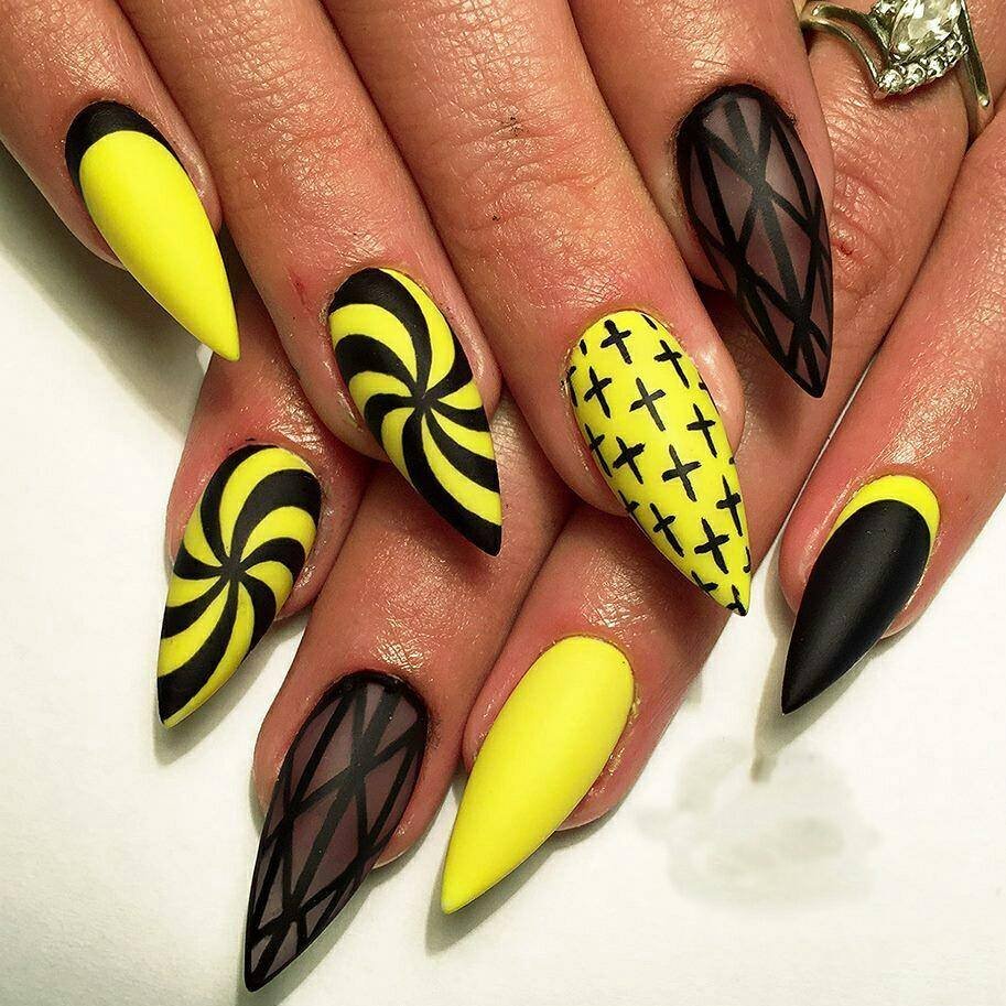 Yellow Stiletto Nails with Black Swirls and Crosshatch Details