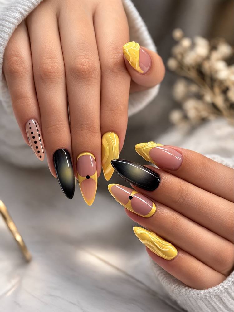 Yellow and Nude Almond Nails with Black Tip Accents