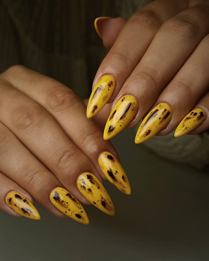 Yellow Nails with Black and White Stripe Accents