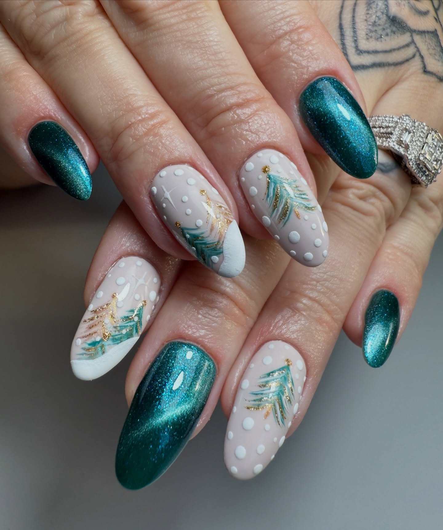 Teal, Pale Blue, and White Marbled Nails
