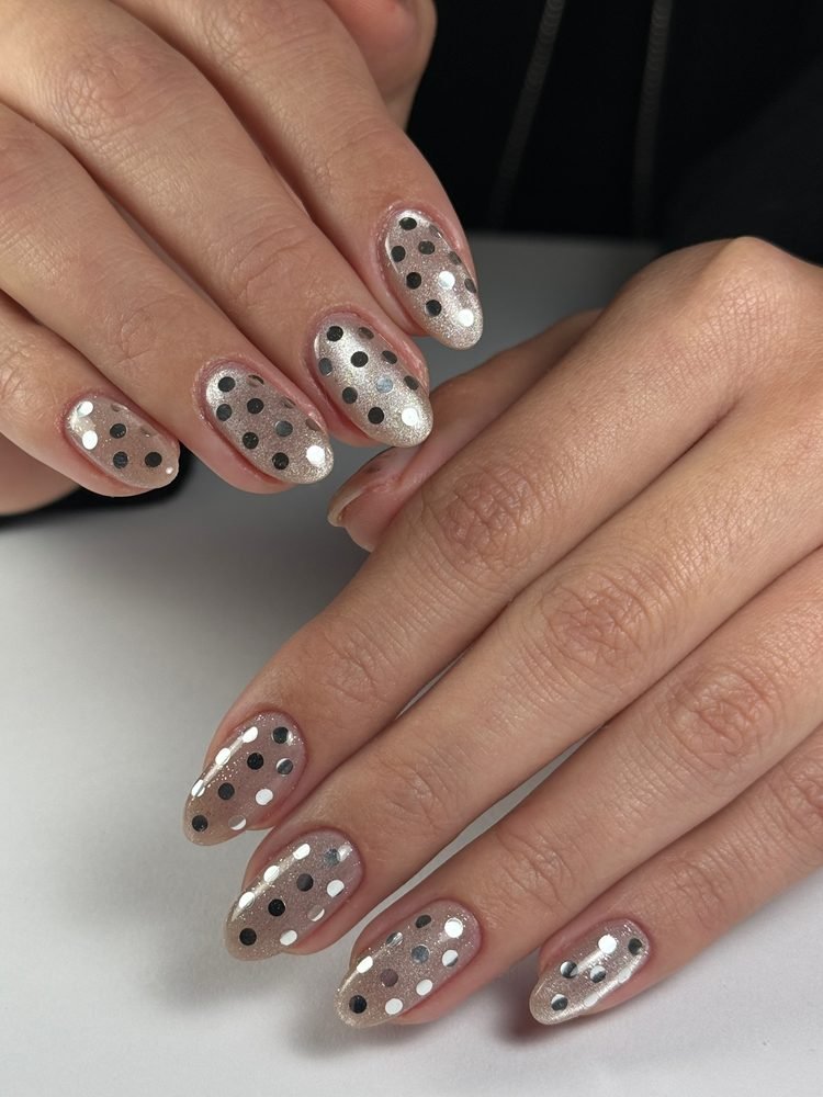 Taupe nude nails with silver dot details