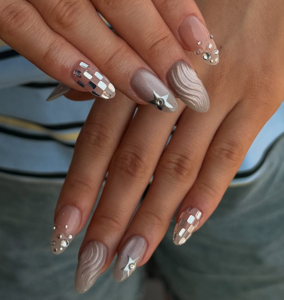 Neutral nails with silver disco accents