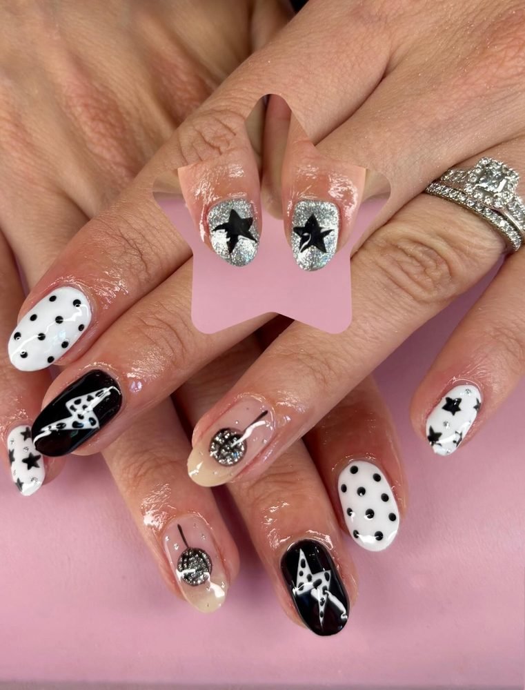 Pink black and white mixed disco nails