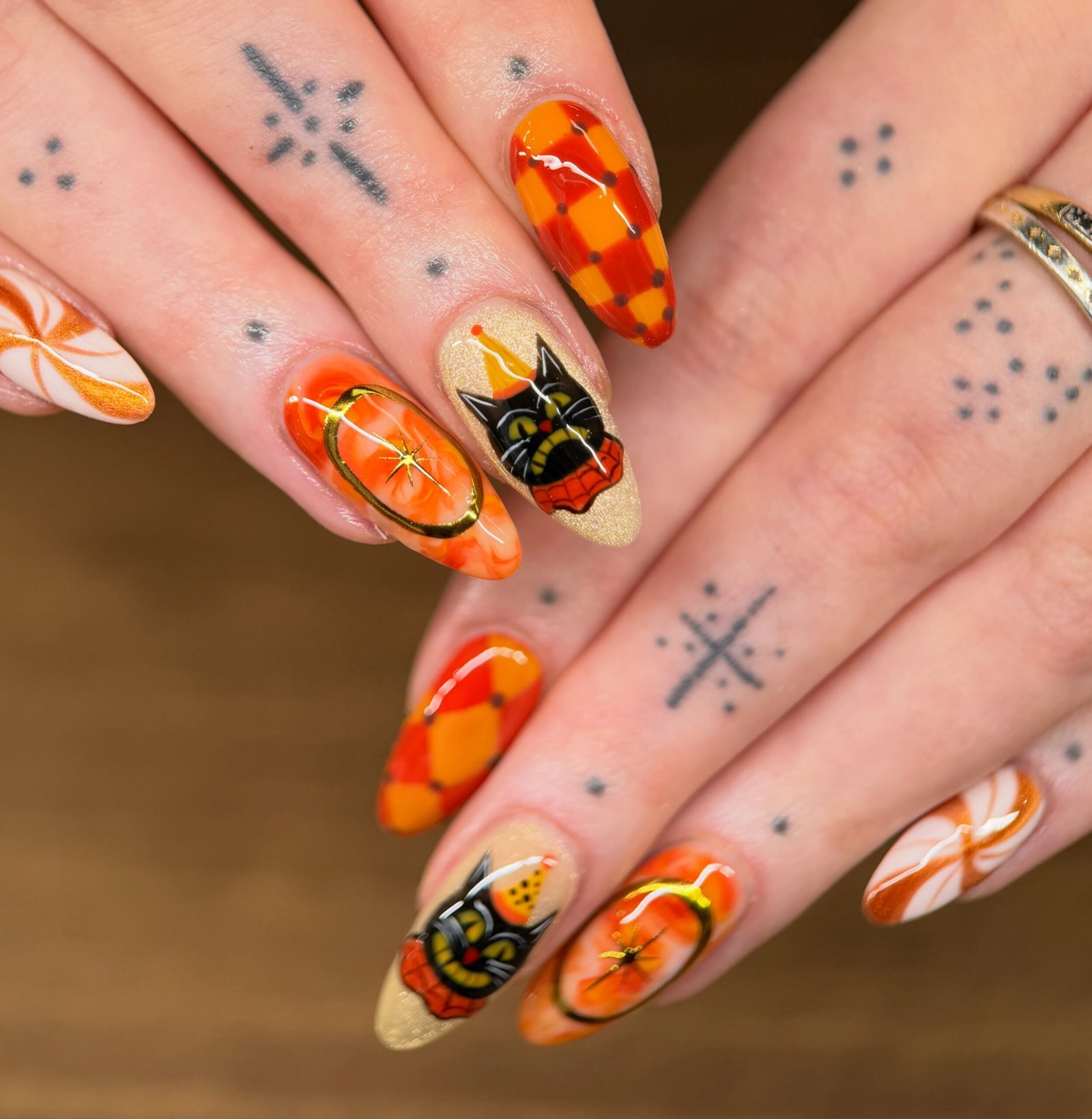 Orange Autumn Mix-and-Match Nails with Graphic Details