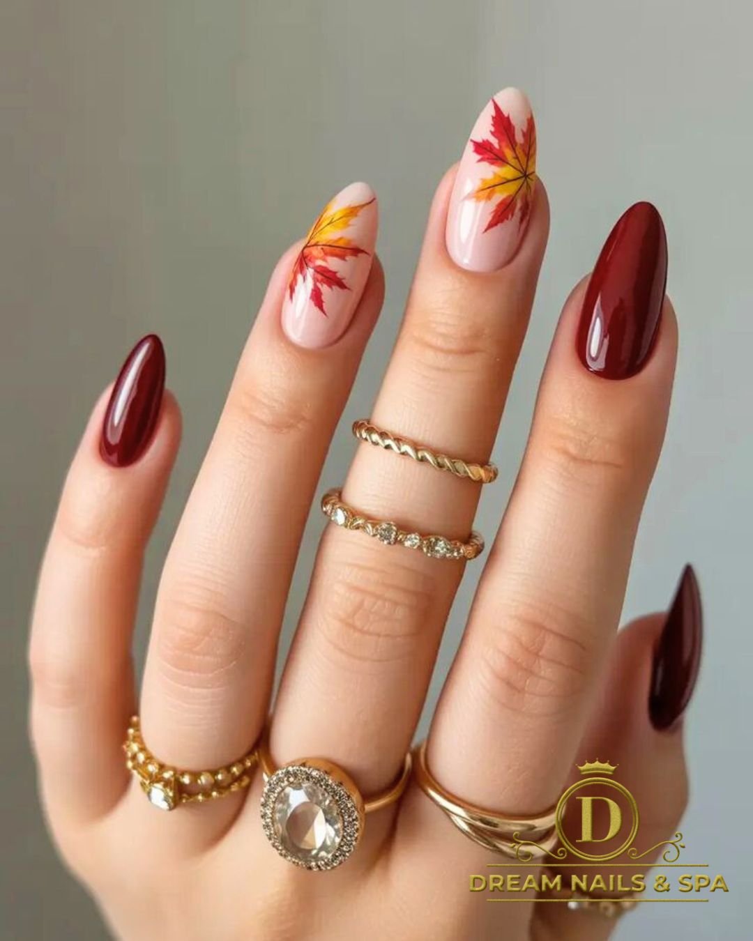 Burgundy and Cream Nails with Gold and Checkered Accents