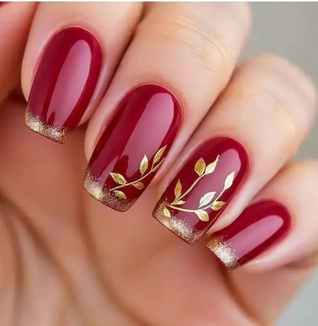 Berry Red Nails with Gold and Cream Floral Details