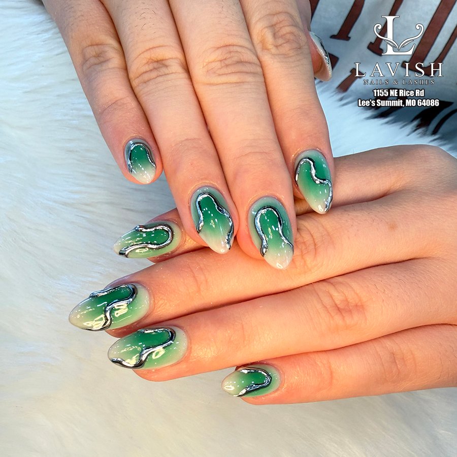 Green Aura Almond Nails with Swirling Accents