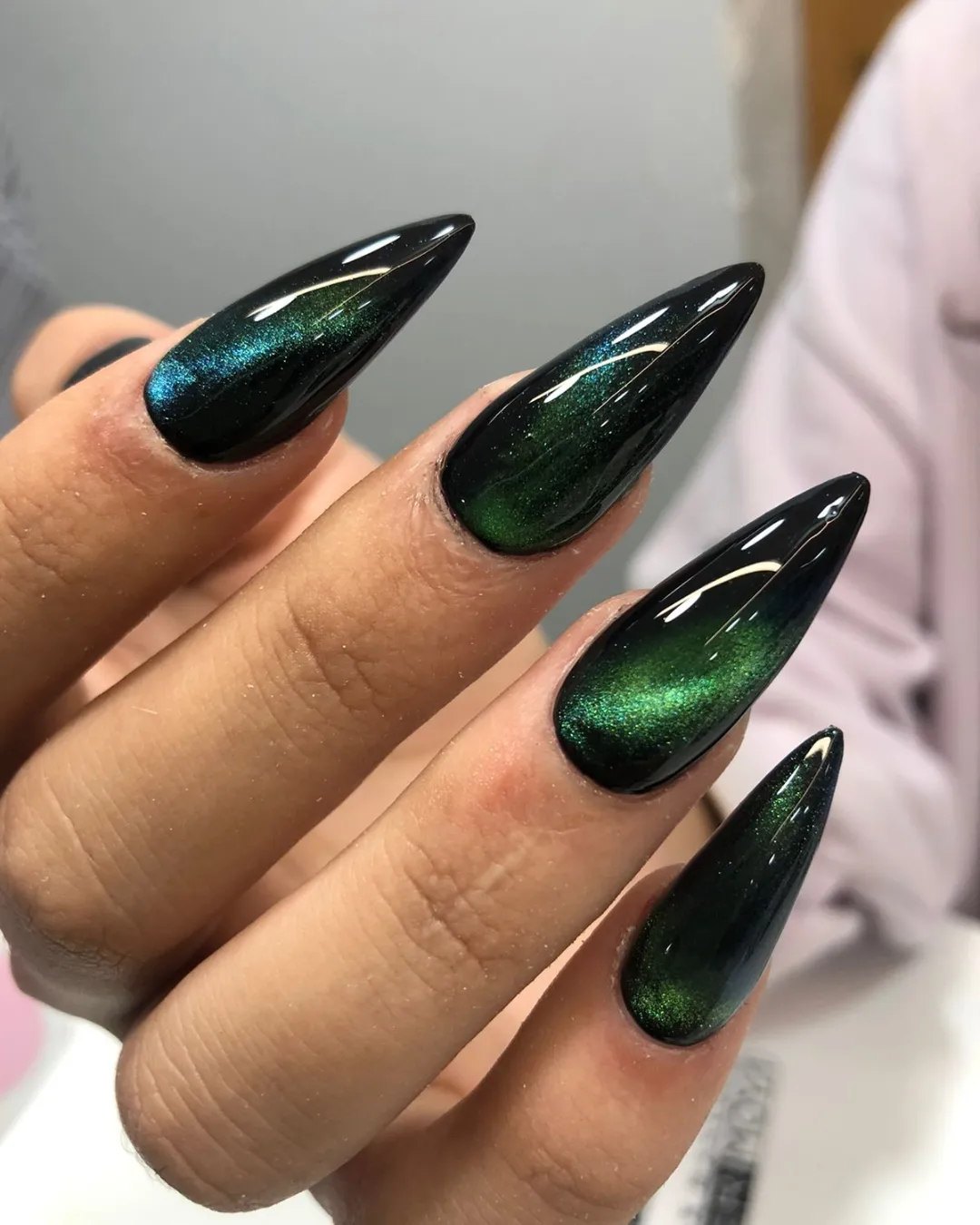 Glossy Black and Emerald Green Stiletto Nails