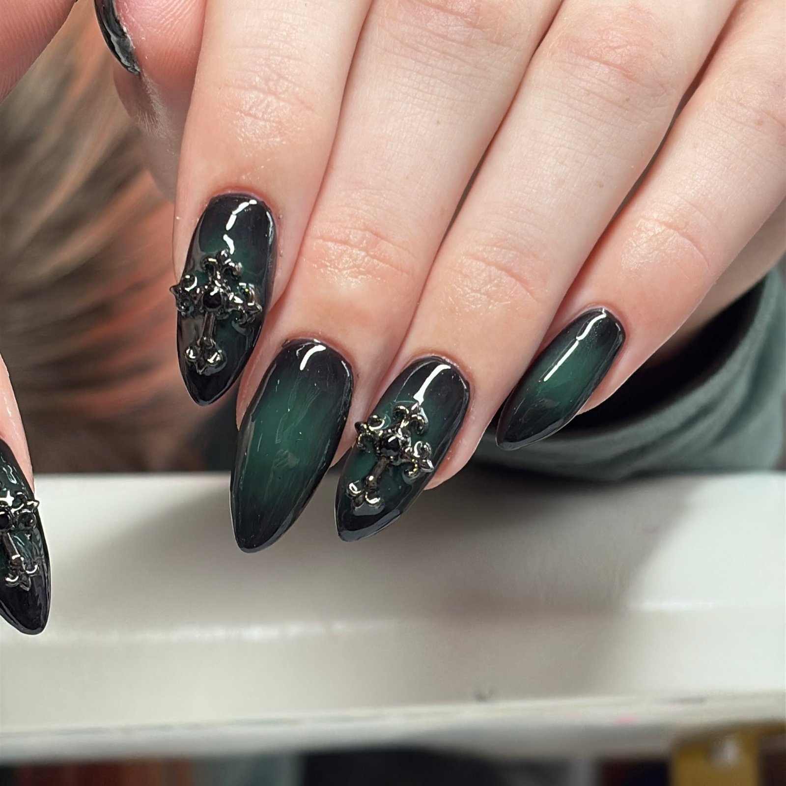 Emerald Green Almond Nails with Dark Textured Accents