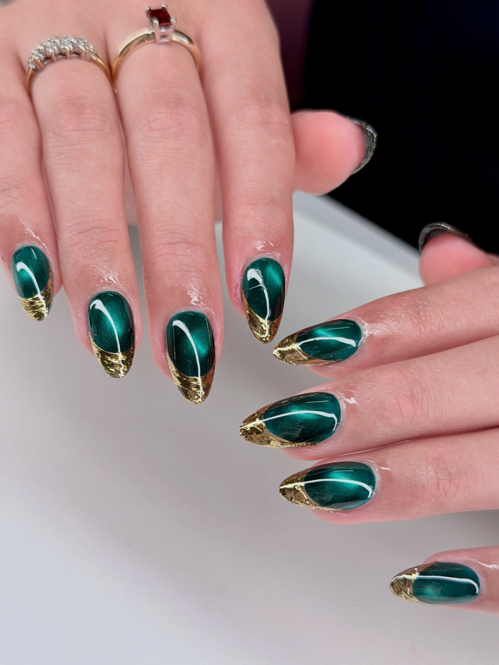 Emerald Green French Almond Nails with Gold Edging