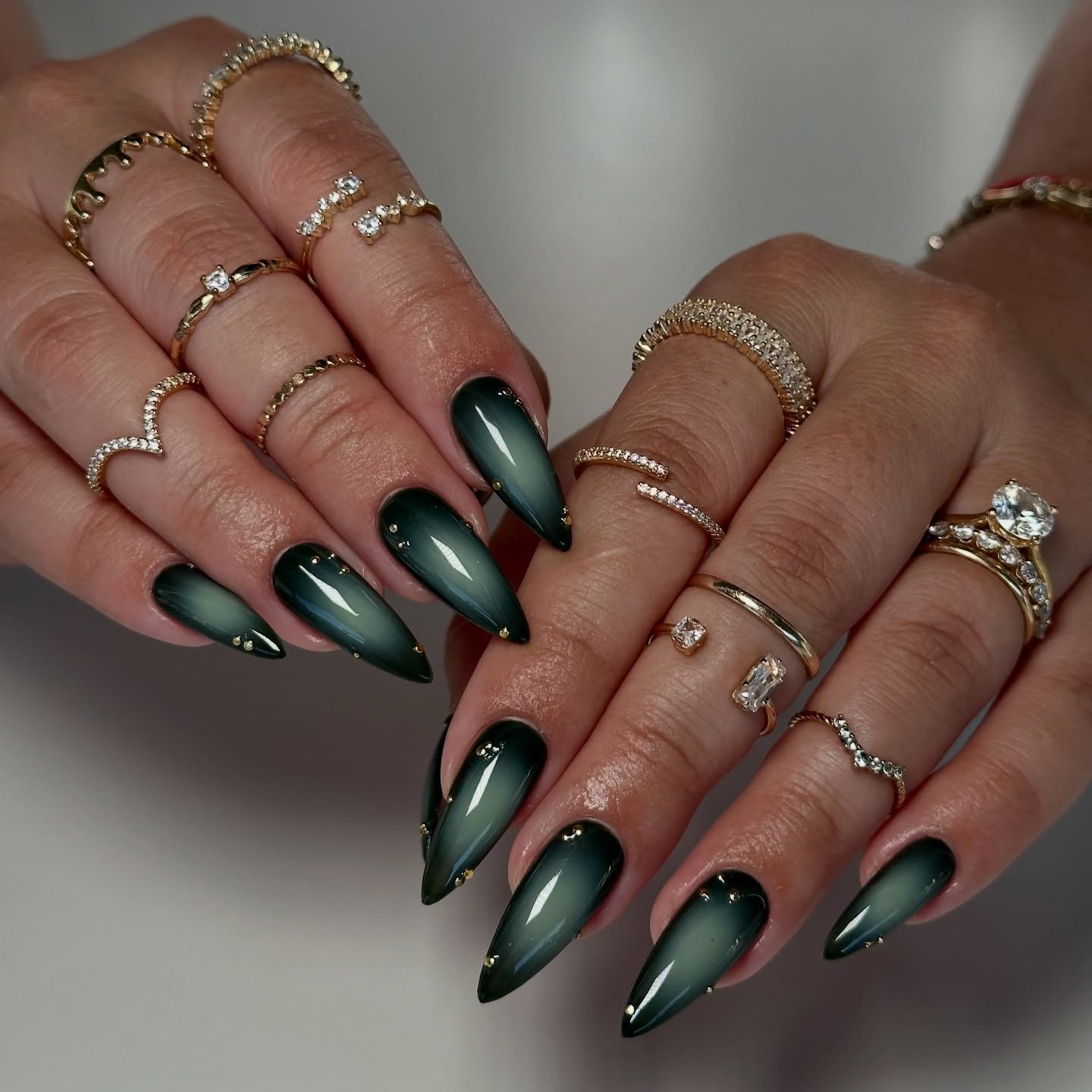 Emerald Green Almond Nails with Nude Negative Space