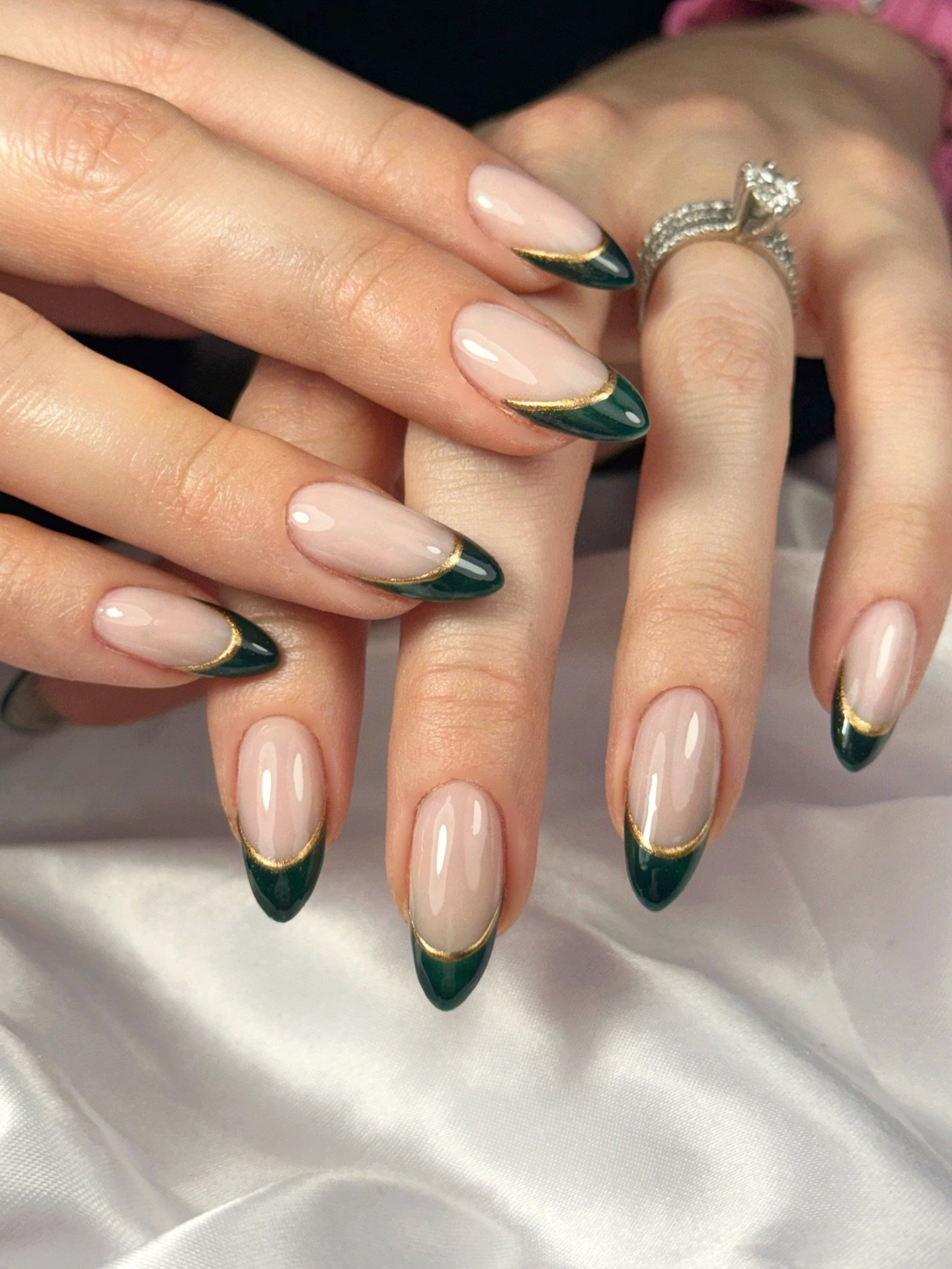 Matte Emerald Almond Nails with Curved Silver Lines
