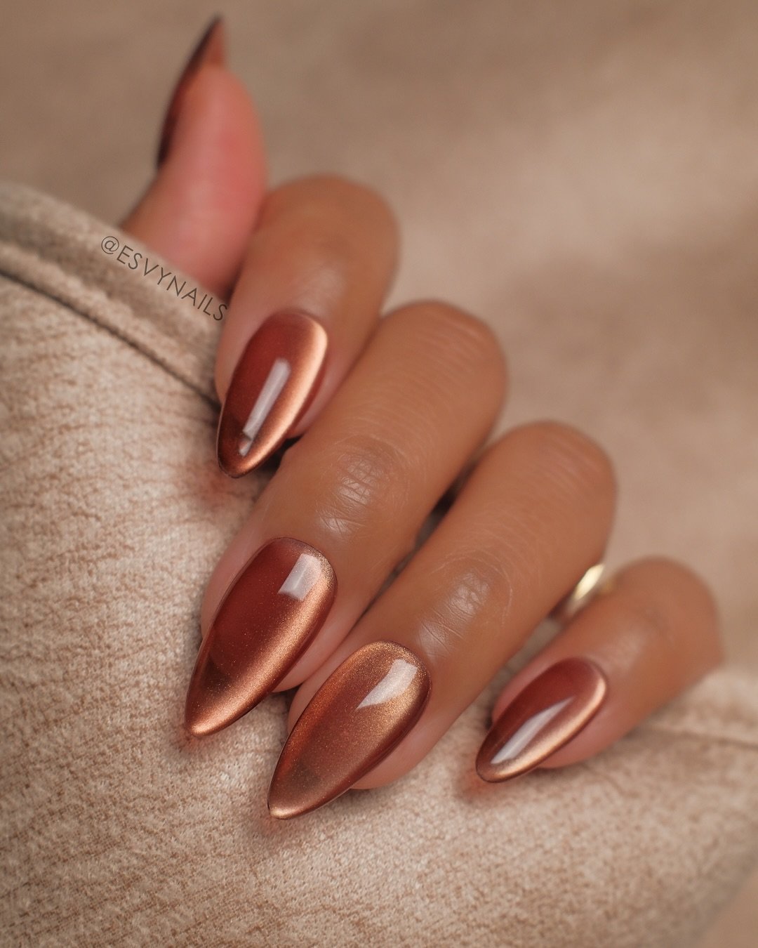 Rose Gold Chrome Almond Nails