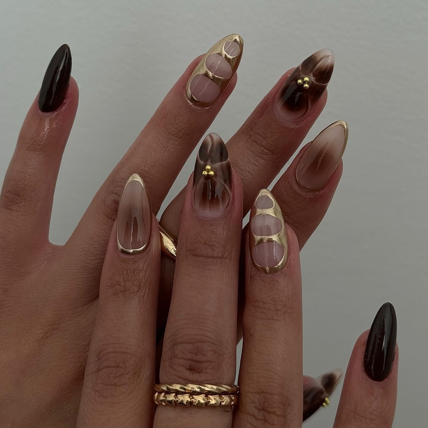 Brown and Nude Almond Nails with Gold Details