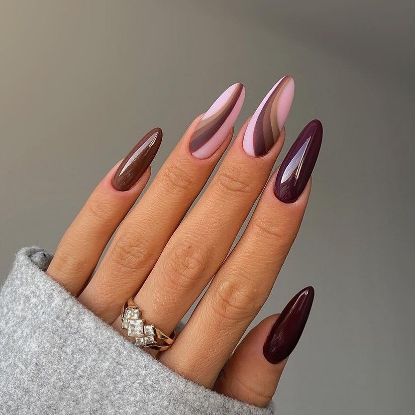 Deep Burgundy Almond Nails with Subtle Color Variation