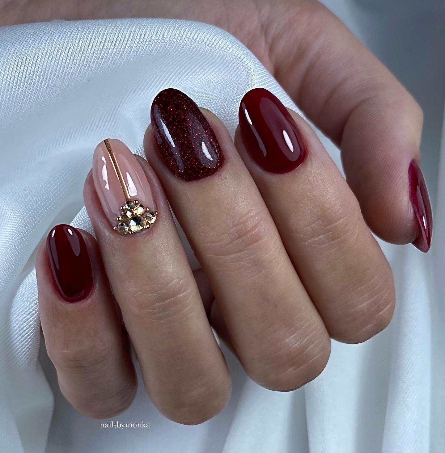 Deep Burgundy Short Nails with a Gold Accent