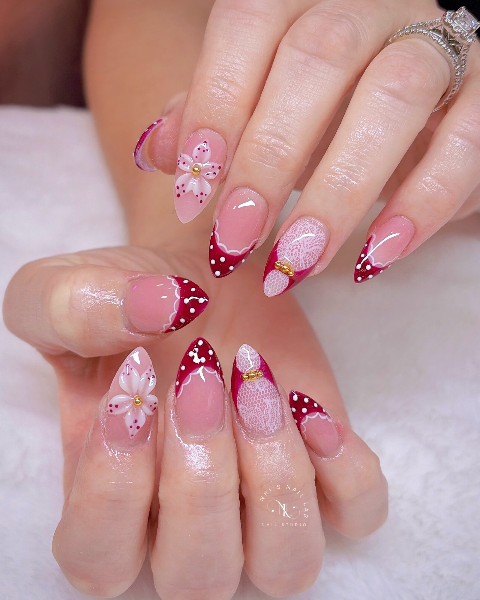 Pink and Burgundy Almond Nails with Floral Details