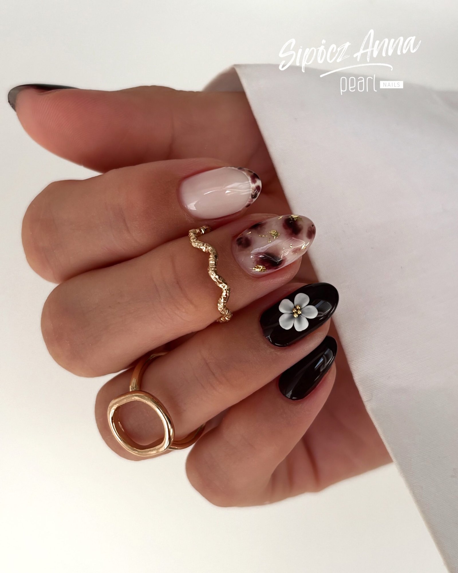 Neutral Nails with Black, Brown and Floral Accent Art